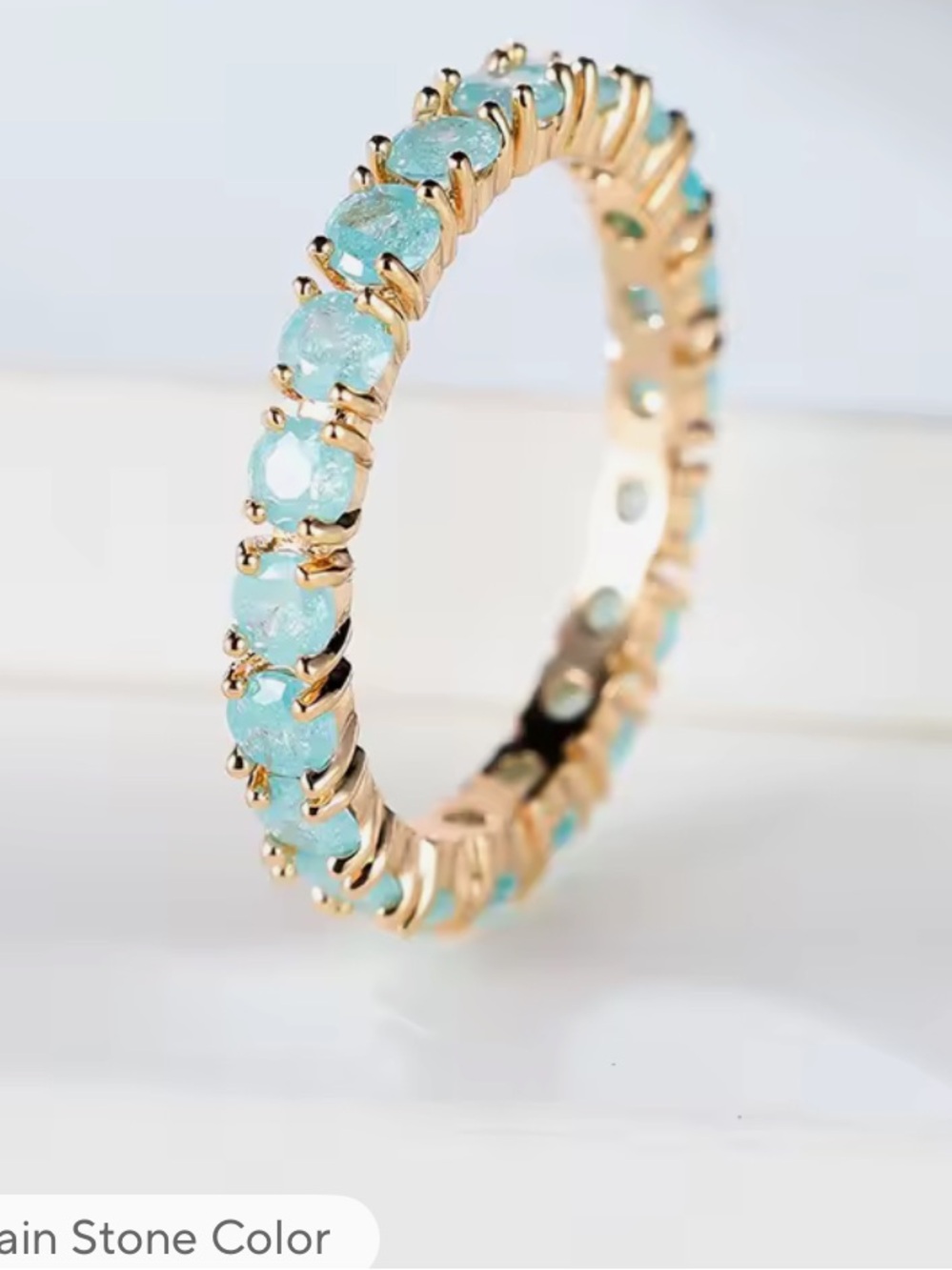 Gold Band Ring with Turquoise Blue Stones